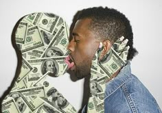 a man sticking his tongue out while standing in front of a pile of dollar bills