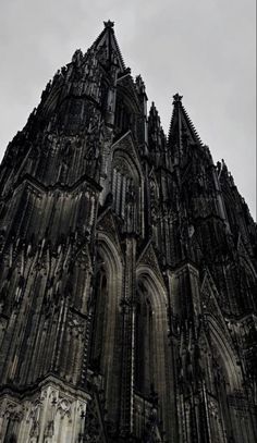 the top of an old cathedral with steeples