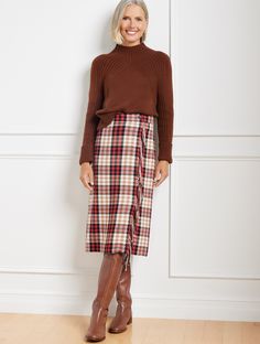 A wrap-inspired silhouette defines our A-line style skirt. In a timeless plaid pattern with playful fringe detail at the front. So chic and flattering. Features A-Line Hits Below Knee Concealed side zip closure Lined Imported Fit: Misses: 26"; Petite: 23 1/2"; Plus: 26" Material: 35% Acrylic, 33% Polyester, 25% Wool, 7% Nylon; Lining: 100% Polyester Care: Dry Clean | Fringe Wrap Skirt - Amazing Plaid Talbots Skirts With Tall Boots, Skirt With Stockings, Culottes Skirt, Wool Wrap Skirt, Tartan Skirt, Women's Outfits, Scarf Women Fashion, Crochet Clothing, Fall Plaid