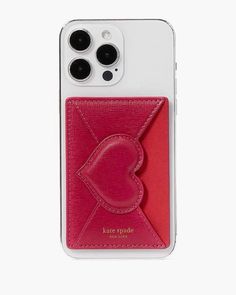 an iphone case with a heart on the front and red card holder attached to it