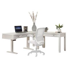 a computer desk with a chair and laptop on it, in front of a white background