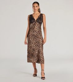 This sleek leopard print satin midi dress is designed with a sheer lace bust overlay for a sexy-chic vibe. It features a sleeveless V-neckline with a tie-front detail, tank shoulder straps, and a midi-length hem with a flowy A-line silhouette.Fit & FeaturesLeopard-printed satin woven fabricSheer lace bust overlayV-neckline with tie-front detailTank shoulder strapsMidi-length hemA-line silhouetteRuns true to size Orange Homecoming Dresses, Midi Dress Brown, Purple Homecoming Dress, Backless Dress Short, White Homecoming Dresses, Lace Dress Styles, Red Homecoming Dresses, Blue Homecoming Dresses, Red Bridesmaid Dresses