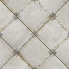 an image of a tile floor that looks like it has been cleaned and is dirty