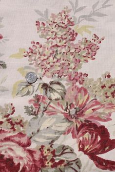 a close up of a flower pattern on fabric