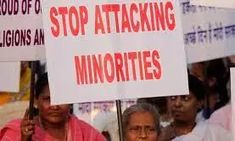 several people holding up signs in protest for the upcoming state's anti - attacks