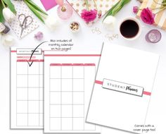 two blank calendars sitting on top of a table next to flowers and other items