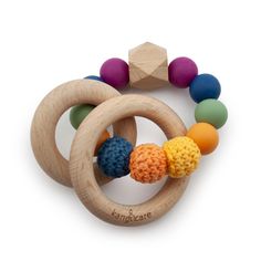 a wooden toy with multicolored beads on it