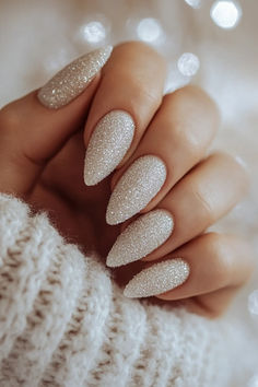 15 Chic Neutral Holiday Nails You’ll Adore Fair Isle Nails, Holiday Party Nails Sparkle, New Year’s Eve Nails Almond, Neutral Christmas Nails Acrylic, Glitter New Years Nails, Christmas And New Years Nail Ideas, Icy Nails Winter, New Years Nails Almond, New Years Eve Nails Ideas Sparkle