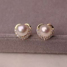 Luxury Flower-shaped Pearl Earrings For Anniversary, Luxury Festive Jewelry Sets With Pearl Drop, Elegant Luxury Chandbalis With Pearl Drop, Luxury Gold Jhumkas With Pearl Drop, Luxury Bollywood Pearl Earrings For Diwali, Luxury White Jhumkas With Pearl Drop, Luxury Bollywood Jhumkas With Pearl Drop, Luxury Bollywood Chandbalis With Pearl Drop