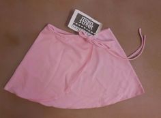 This is a brand new ballet wrap skirt with the original Main Street Dancewear hang tag in the color LIGHT PINK (as opposed to the darker brighter candy pink). This is classic wrap skirt with a self side tie. This is a multi-listing so you will have to view available inventory with the drop down boxes. I have a huge listing with 13 colors in it, this listing is just for the light pink.  Refer to the measurement guide provided with the pictures to confirm a good fit.  Medium child has a 10 inch le Ballet Wrap Skirt, Love Dance, Color Light Pink, Dance Ballet, Street Dance, Candy Pink, Pink Candy, Mean Girls, Main Street