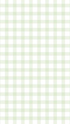 a green and white checkered background with small squares on the bottom right hand corner