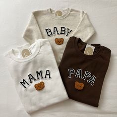 three baby t - shirts with teddy bears on them, one is brown and the other is white