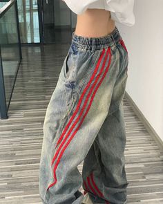 These wide-leg jeans feature a vintage washed denim design with bold red side stripes, creating a unique 90's style look Size:• S: Waist: 64cm/ 25.2 in, Hips: 106cm/ 41.7 in, Length: 101cm/ 39.8 in• M: Waist: 68cm/ 26.8 in, Hips: 110cm/ 43.3 in, Length: 102cm/ 40.2 in• L: Waist: 72cm/ 28.3 in, Hips: 114cm/ 44.9 in, Length: 103cm/ 40.6 in• XL: Waist: 77cm/ 30.3 in, Hips: 119cm/ 46.9 in, Length: 104cm/ 40.9 in• 2XL: Waist: 82cm/ 32.3 in, Hips: 124cm/ 48.8 in, Length: 105cm/ 41.3 in• 3XL: Waist: 87 Applique Jeans, Girls Streetwear, Jeans Trend, Street Aesthetic, Street Jeans, Retro Jeans, Streetwear Jeans, Oversized Jeans, Jean Vintage