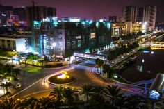 an aerial view of a city at night