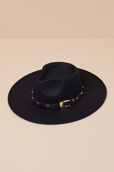 Stroll into town looking oh-so-cool in the Four Buttons Enviable Confidence Black Western Fedora Hat! Sturdy felt shapes this classic hat that has a wide, flat brim and a high collar with a decorative, belt-inspired hatband with a shiny metal buckle and round studs throughout. A teardrop-shaped dipped crown completes the look. Gold hardware. 3. 50" Soft Brim. 23" Interior Circumference. Crown Measures 4" Tall. 100% Polyester. Spot Clean. Imported. Lulus | Enviable Confidence Black Western Fedora Felt Shapes, Classic Hats, Felt Fedora, Studded Belt, Hat Band, Fedora Hat, Metal Buckles, High Collar, The Four