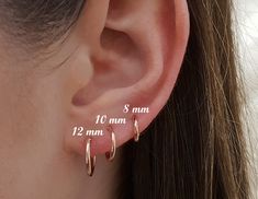 a woman's ear is shown with the measurements