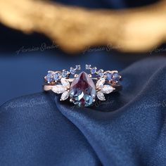 Pear Alexandrite Ring, Unique Sapphire Wedding Rings, Pear Alexandrite Engagement Ring, Alexandrite Engagement Ring Set, Alexandrite Engagement Ring Vintage, Alexandrite Engagement Ring Silver, Promise Rings Blue, Untraditional Wedding Rings, Magical Engagement Rings