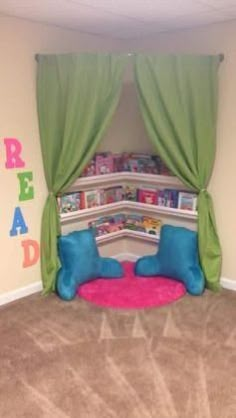 a child's bedroom with green drapes and pink rug