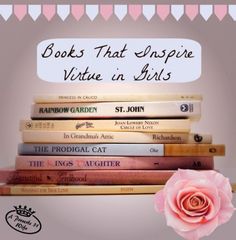 a pink rose sitting on top of a stack of books