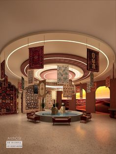 a large room with lots of rugs hanging from the ceiling