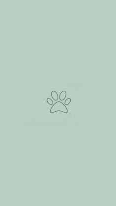 a dog's paw is shown in the middle of a light green wallpaper