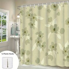 a shower curtain with white flowers on it