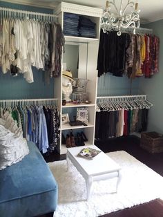 the closet is organized with clothes, shoes, and other things to wear in it