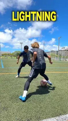 two people are playing soccer on a field with the words lightning in front of them