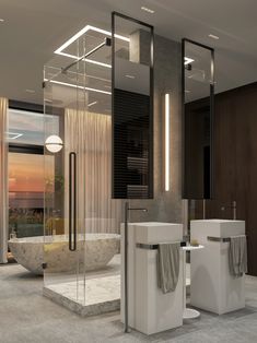 a modern bathroom with two sinks and a bathtub in the middle of the room