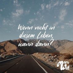 a road with mountains in the background and a quote written on it that says, when night in dissem leben, wanna down?