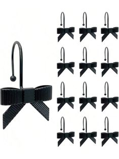 10 pairs of black bow tie clips with clippings on each side and one pair of