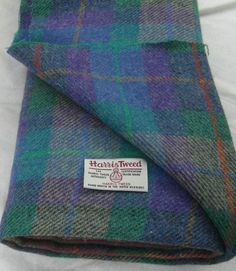 a blue and green plaid fabric with a label on the side that says hampsweed