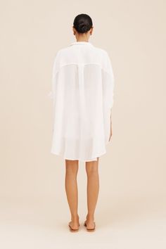 BUY 2 L'ESSENTIALS PIECES, GET 30% OFF Made from a delicate cotton/linen blend, it has an oversized fit that's emphasised by it's billowy hem. Lightweight and versatile, this shirt is easy to wear and has an effortless, breezy feel to it. Oversized shirt Button entry Collared neckline Longline back Slightly sheer Material: 55% EU certified flax linen 45% Cotton Made in India One size fits most Summer Long Sleeve Chemise For Loungewear, Relaxed Fit Shirt For Daywear, Long Sleeve Summer Chemise For Daywear, White Long Sleeve Chemise For Daywear, White Long Sleeve Chemise For Spring, White Long Sleeve Spring Chemise, Oversized Summer Loungewear Shirt, Chic Cotton Tunic For Day Out, Summer Cotton Shirt Dress For Daywear