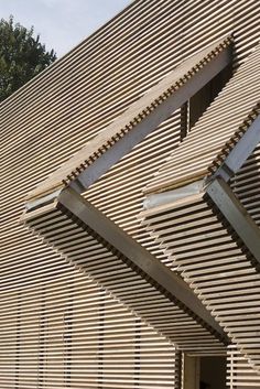 the side of a building that has wooden slats on it