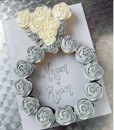 a wedding card with cupcakes in the shape of roses