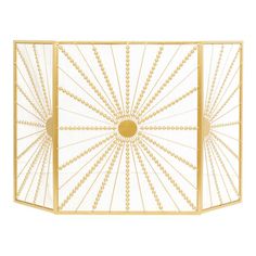 an art deco style fireplace screen in gold and white