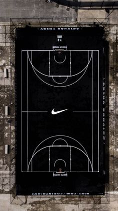 an overhead view of a basketball court in the middle of a wall with graffiti on it