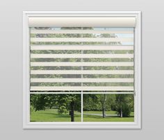 an open window with white blinds in front of trees and grass on the other side