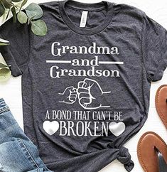 "Grandma and Grandson Bond That Cant Be Broken Shirt, Grandma Gift Shirt, Grandson Gift Shirt, Grandma and Grandson Shirt Hello! The Unisex t-shirts are retail fit and a little bit relaxed. If you want to have a fitter look, I recommend you order one size smaller. But make sure you check our size-chart before you place your order. The inscriptions on the T-shirts are black in light colors and white in dark colors. So, here is a brief description for you to-see-the order-process: 1-) Please, Chec Grandson Shirt, Grandma And Grandson, Grandson Gift, Grandma Shirt, Cute Shirt Designs, Grandma Shirts, Grandma Gift, Gifts For My Wife, T Shirts With Sayings