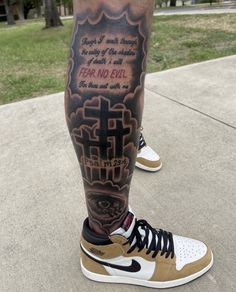 a man with a tattoo on his leg