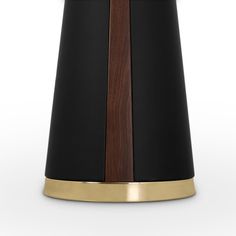 a black and gold table lamp with wooden accents