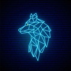 a neon blue wolf head on a dark brick wall with the light shining through it