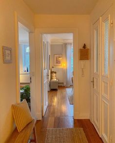 the hallway is clean and ready to be used as a living room or dining area