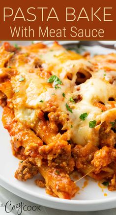 pasta bake with meat sauce on white plate Ricotta Beef Pasta, Rotini With Meat Sauce, Ricotta Cheese Casserole Recipes, Rigatoni Recipes With Ricotta Cheese, Baked Penne With Ground Beef, Baked Rigatoni With Ricotta, Pasta With Ricotta Cheese, Baked Penne Pasta Recipes, Rigatoni Bake