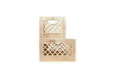 two wooden boxes sitting side by side on top of each other, one with a lattice design and the other without