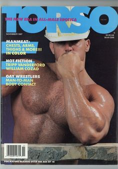 a man with no shirt on the cover of a magazine