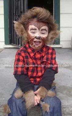 an image of a person wearing a costume on their face and sitting in front of a door