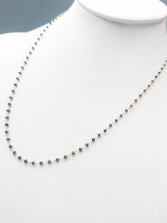 Faceted black diamond bead rosary necklace. Necklace is available in 14k and 18k in both white and yellow gold. Contains 2mm-2.5mm faceted beads on an adjustable length chain with 16", 17", and 18" options. Item can also be made to order in custom length and bead sizes. Stone - Black Diamond(Heat Treated) Total Diamond Weight -6.0cts (estimated) Length - 16", 17" and 18" Skus: 14k Yellow Gold(03385) 14k White Gold(03384) 18k Yellow Gold(09249) 18k White Gold(09250) Rosary Jewelry, Bead Rosary, Bead Sizes, Rosary Necklace, Unique Diamonds, Necklace Necklace, Short Necklace, Faceted Bead, Rosary