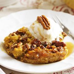 a white plate topped with pecan pie and ice cream