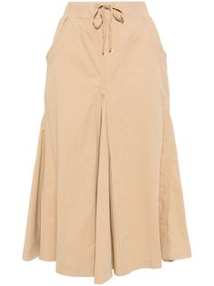 light brown cotton elasticated drawstring waistband pleat detailing two diagonal pockets to the sides below-knee length Chic Cotton Skirt With Drawstring, Summer Cotton Pleated Skirt For Work, Spring Cotton Pleated Skirt For Workwear, Casual Daywear Bottoms With Pleated Hem, Casual Bottoms With Pleated Hem For Daywear, Cotton Long Skirt With Drawstring, Beige Midi Length Bottoms For Daywear, Beige Cotton Pleated Skirt, Beige Pleated Cotton Skirt